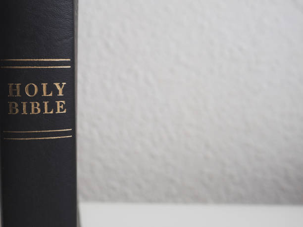 istock Black holy bible with white background and copy space 1306500266