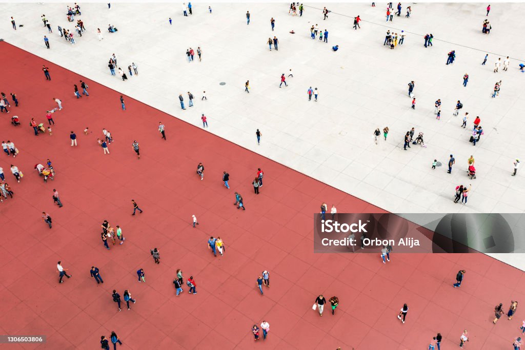 Crowds standing on two separated zones People Stock Photo