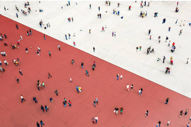 Crowds standing on two separated zones Crowds standing on two separated zones contrasts stock pictures, royalty-free photos & images