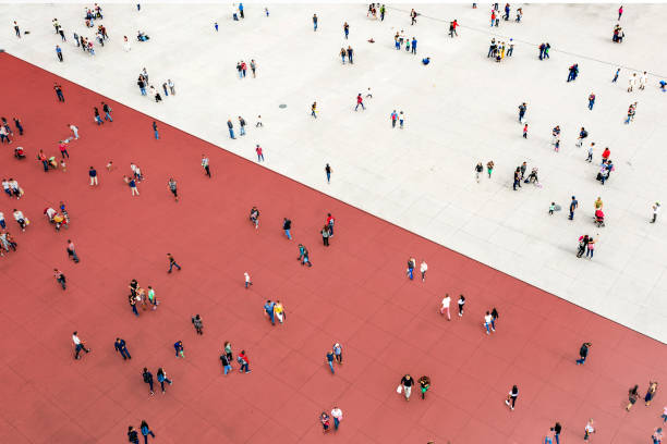 Crowds standing on two separated zones Crowds standing on two separated zones division stock pictures, royalty-free photos & images