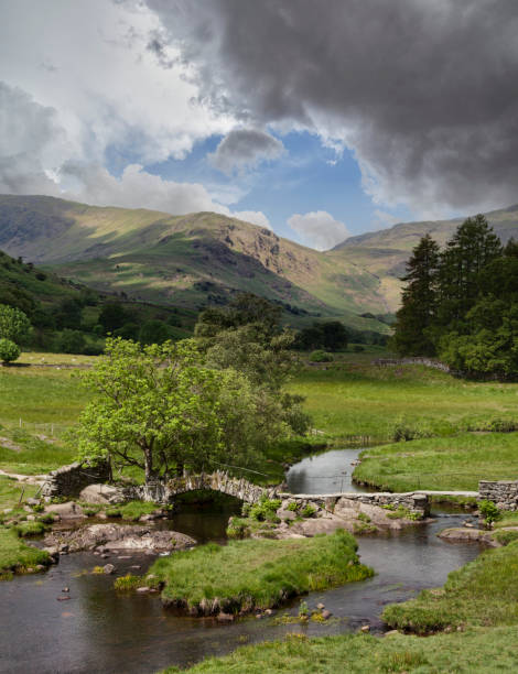 Slaters Bridge and fells in Little Langdale valley in the English Lake District