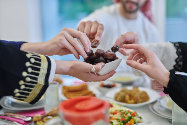 istock Muslim family having iftar together during Ramadan. 1306509329