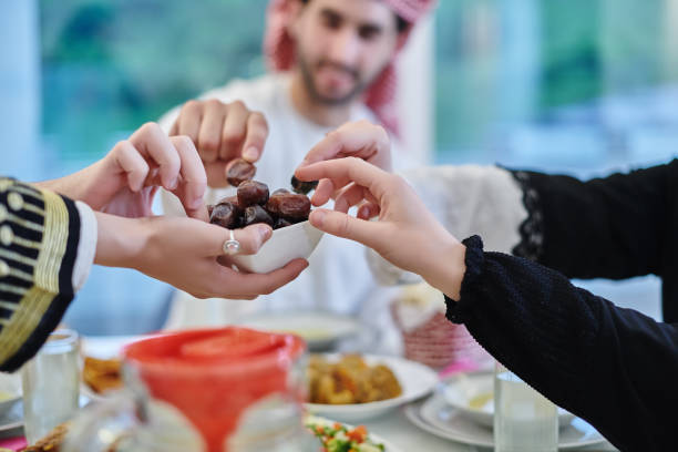 istock Muslim family having iftar together during Ramadan. 1306510379