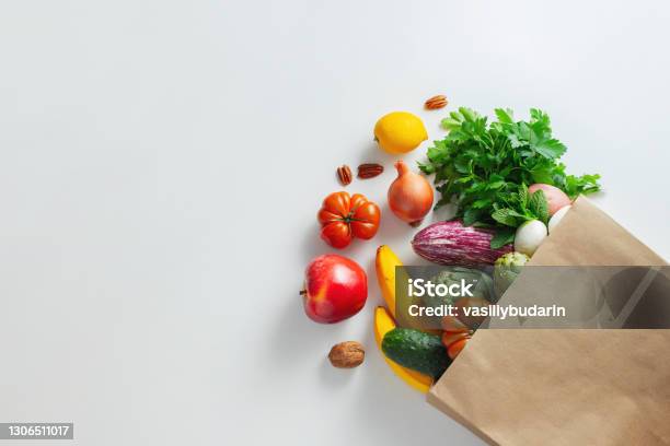 Healthy Food Background Healthy Vegan Vegetarian Food In Paper Bag Vegetables And Fruits On White Copy Space Banner Shopping Food Supermarket And Clean Vegan Eating Concept Stock Photo - Download Image Now