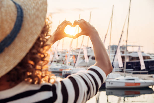 Woman walking by the marina