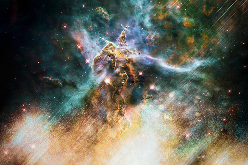 Artist rendition of the Mystic Mountain of Carina Nebula. Deep space look. Science fiction wallpaper. Elements of this image were furnished by NASA.
