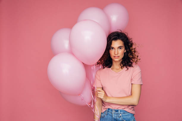 istock Woman with air balloons 1306513655