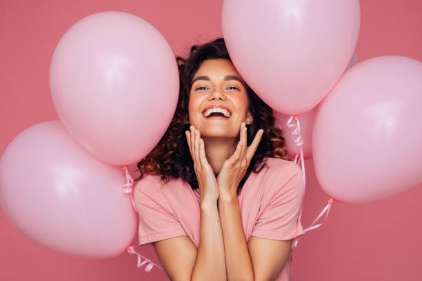 istock Woman with air balloons 1306513694