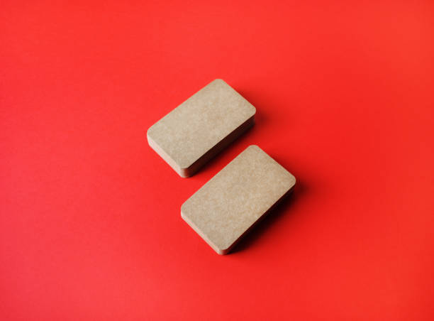 istock Business cards on red 1306513978