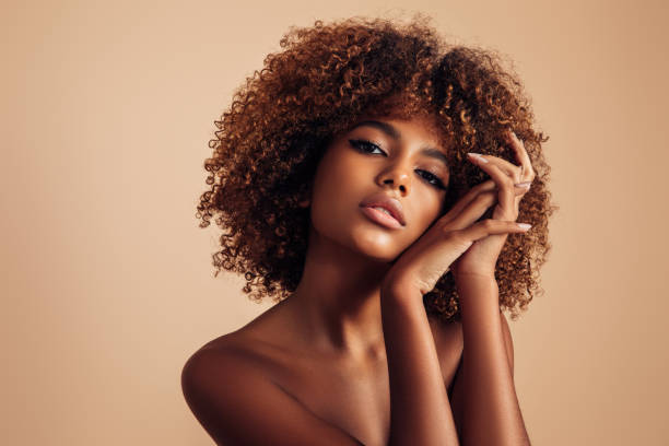 istock Beautiful girl with curly hairstyle 1306514165