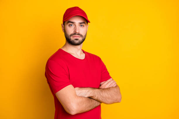istock Profile side view portrait of attractive virile content guy mailman folded arms best service isolated over bright yellow color background 1306515631