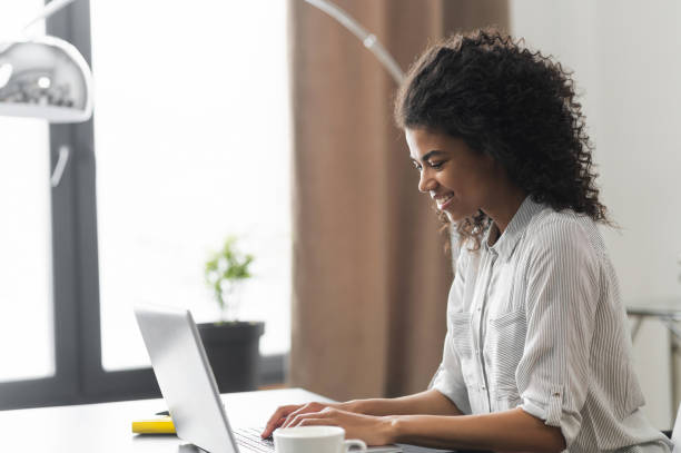 istock African American woman working from home 1306517222