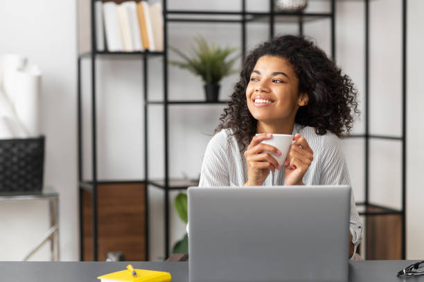 istock African American female freelancer on coffee break 1306517277