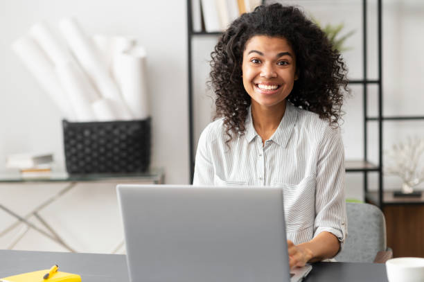 istock Excited African American female office worker 1306517371