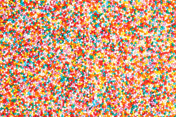 istock Confectionery sprinkles colored glazed sugar, close up. Background. 1306517998