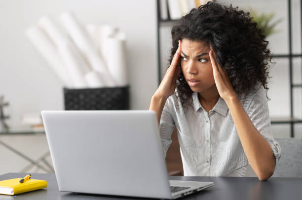 istock African American office worker feeling annoyed 1306518001
