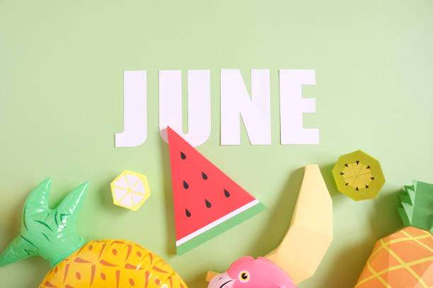 Exotic fruits made of paper on green background Hello, june. Exotic fruits made of paper with inflatable elements on green background. Summer concept. Holiday june photos stock pictures, royalty-free photos & images