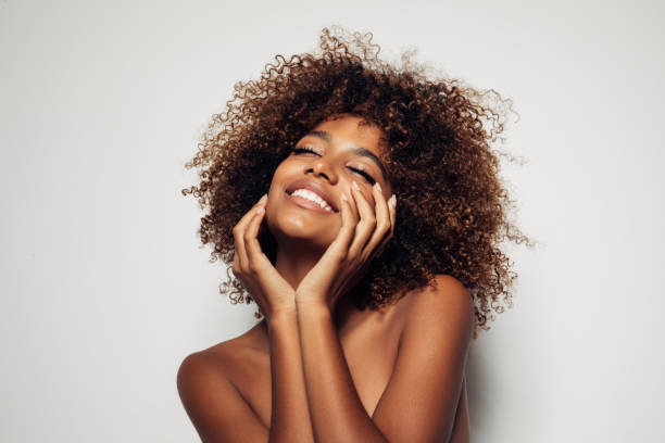 istock Beautiful girl with curly hairstyle 1306520075