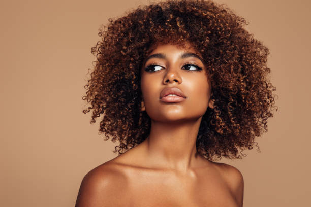 istock Beautiful girl with curly hairstyle 1306520121
