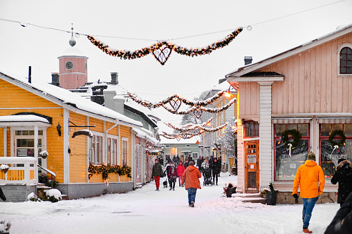 Porvoo, Finland - January 3, 2021: Street in Old Porvoo decorated for Christmas, Finland. Old Porvoo is a historic neighborhood of Porvoo City, the one of most famous touristic places in Finland.