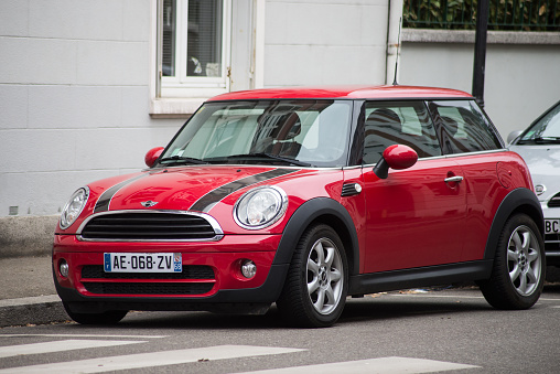 Mulhouse - France  - 11 MArch 2021 - Front view of red mini cooper S parked in the street