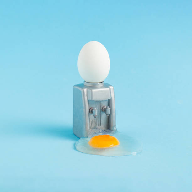 2021 Easter unique composition. Egg spills from the water machine. Holiday and food creative concept.