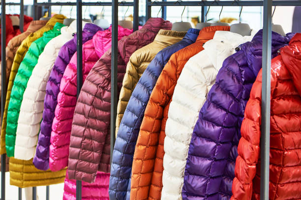 Winter women's jackets on hanger in store