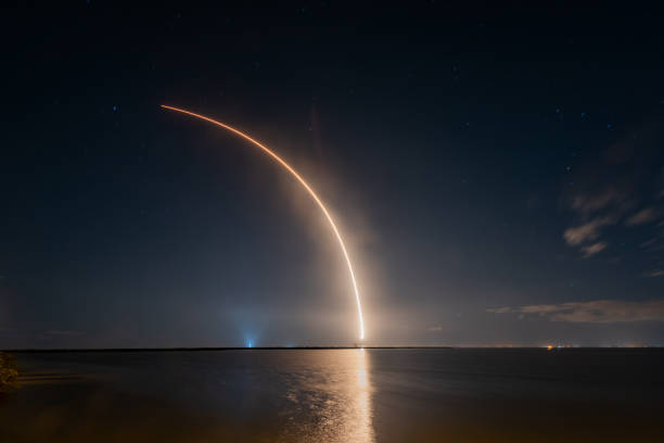 SpaceX Falcon 9 Starlink L20 Launch Long exposure photo of the SpaceX launch of 60 Starlink Internet Satellites on March 11, 2021 at 3:13AM. nasa kennedy space center photos stock pictures, royalty-free photos & images