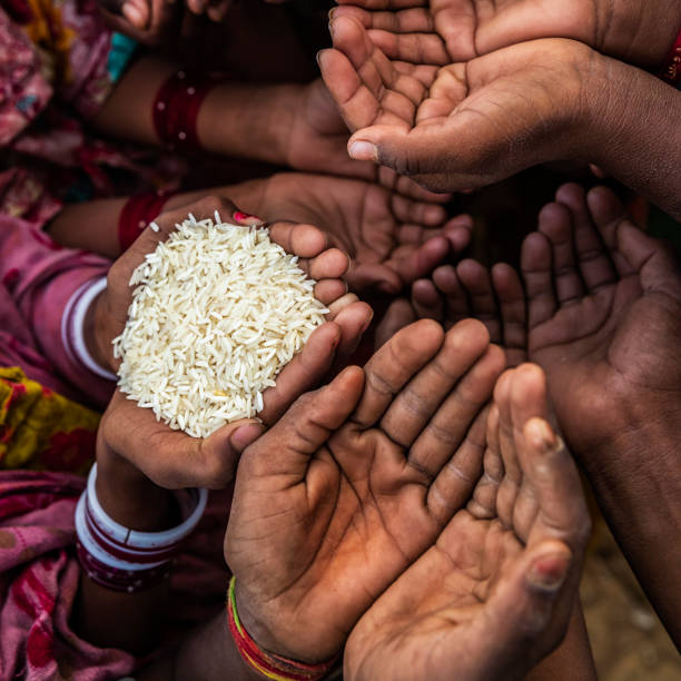 istock Poor Indian children asking for food, India 1306532198