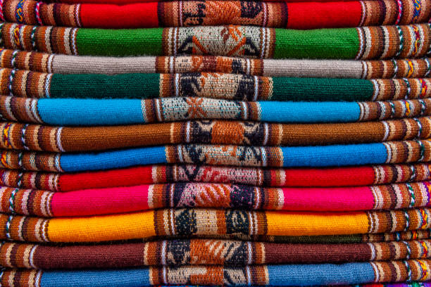 istock Colorful Peruvian fabrics for sale, Cuzco market, Peru 1306533379