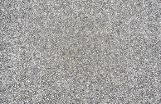 Gray granite background from small stones.