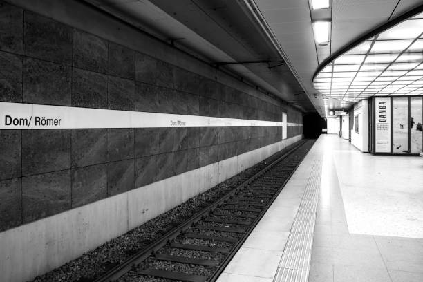 Subway station Römer Frankfurt am Main, deserted because of virus Frankfurt, Germany, 03/18/2020: Subway station Dom/ Römer in Frankfurt am Main. Empty station due to Corona pandemic. Picture in black and white train station black and white stock pictures, royalty-free photos & images