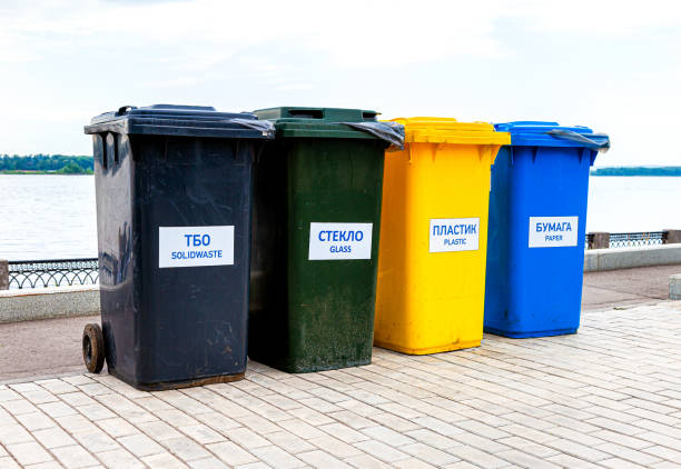 istock Separate garbage containers on city street 1306535365