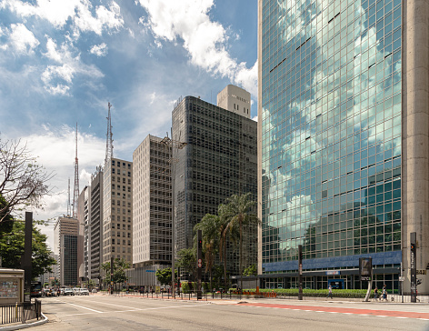 Shows the street view of one of the busiest avenue, and symbol of the city of São Paulo, Avenida Paulista