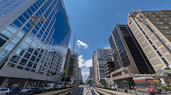 Shows the street view of one of the busiest avenue, and symbol of the city of São Paulo, Avenida Paulista