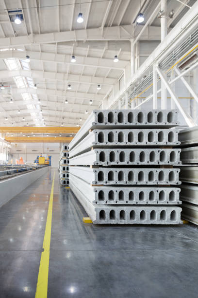 istock Stack of precast reinforced concrete slabs in factory workshop 1306540179
