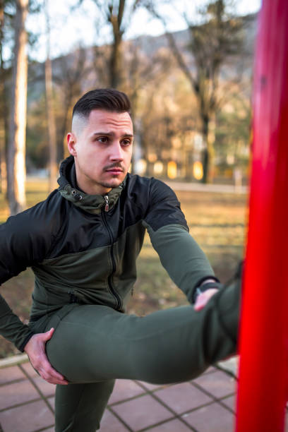istock Sporty man exercising outside 1306547014