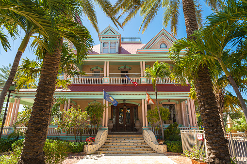 Key West, Florida USA - March 3, 2015: The beautiful Victorian Southernmost House is a popular tourist destination located near the popular southernmost point.