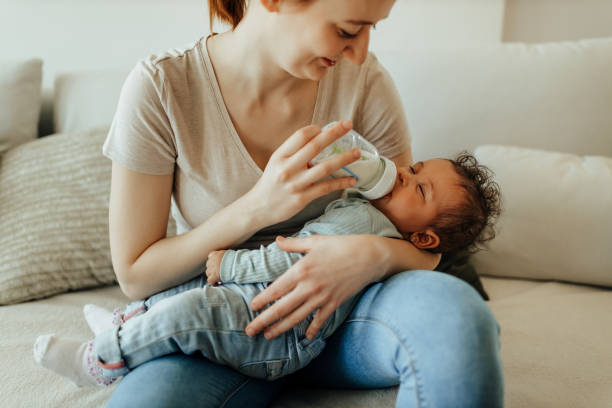 istock Cute baby with her mom. 1306551425
