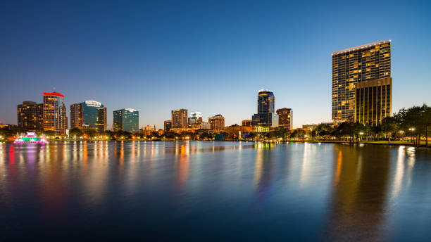 istock Illuminated Orlando skyline at dusk 1306552826