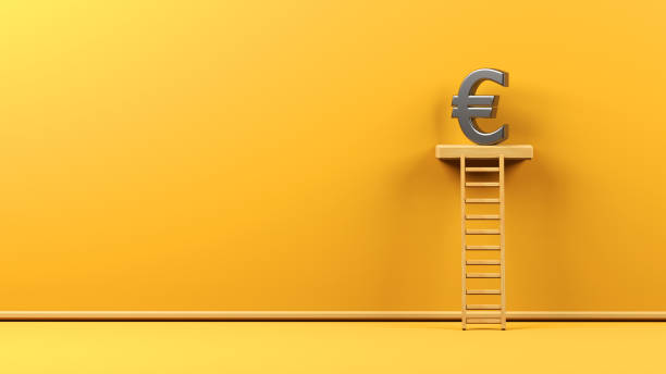 istock Finance concept Metallic euro symbol on yellow-colored background 1306556352