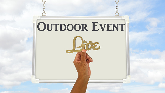 Live Outdoor Event whiteboard sign outdoors blue sky clouds