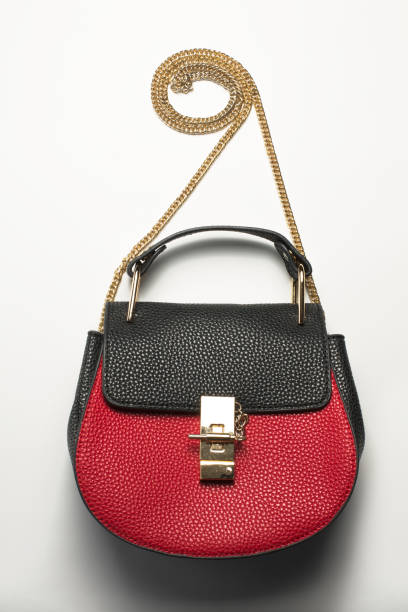 istock Fashionable leather black and red woman's bag 1306557397