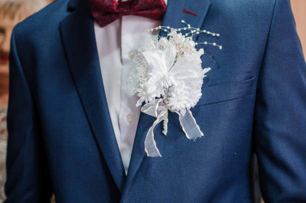 Boutonniere on the groom's jacket