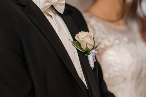 istock Boutonniere on the groom's jacket 1306559826