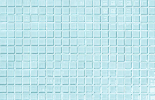istock Blue pastel ceramic wall and floor tiles abstract background. Design geometric mosaic texture decoration of the bedroom. Simple seamless pattern for backdrop advertising banner poster or web. 1306563748