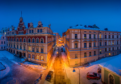 Russia, Leningrad region, Vyborg city. View of Fortress Street, central during winter twilight