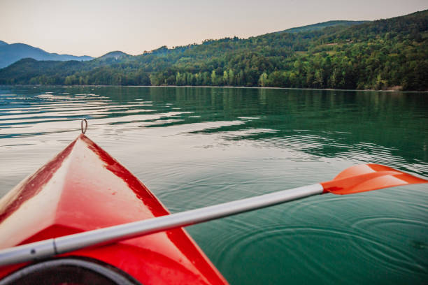 Recreation in a kayak on the lake Photo of front of a kayak on the lake boat on lake stock pictures, royalty-free photos & images