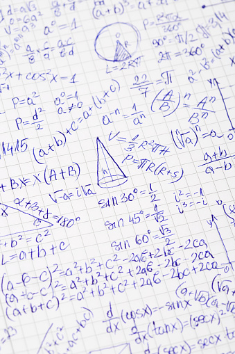 Mathematical  seamless pattern background with formulas, equations and figures, handwritten in a notebook