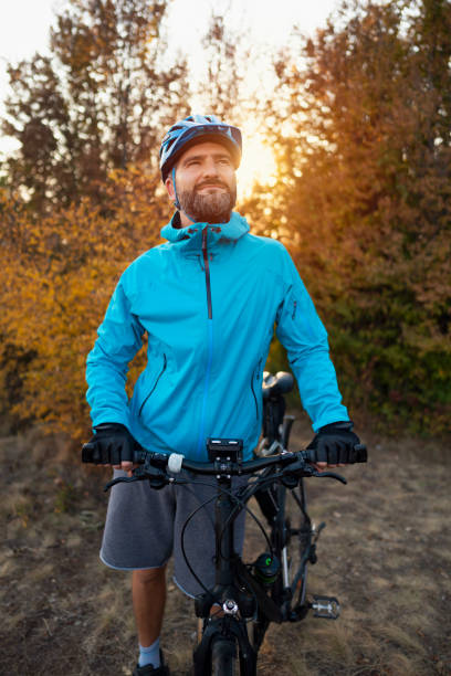 istock Front view of a man cyclist enjoying nature 1306566739